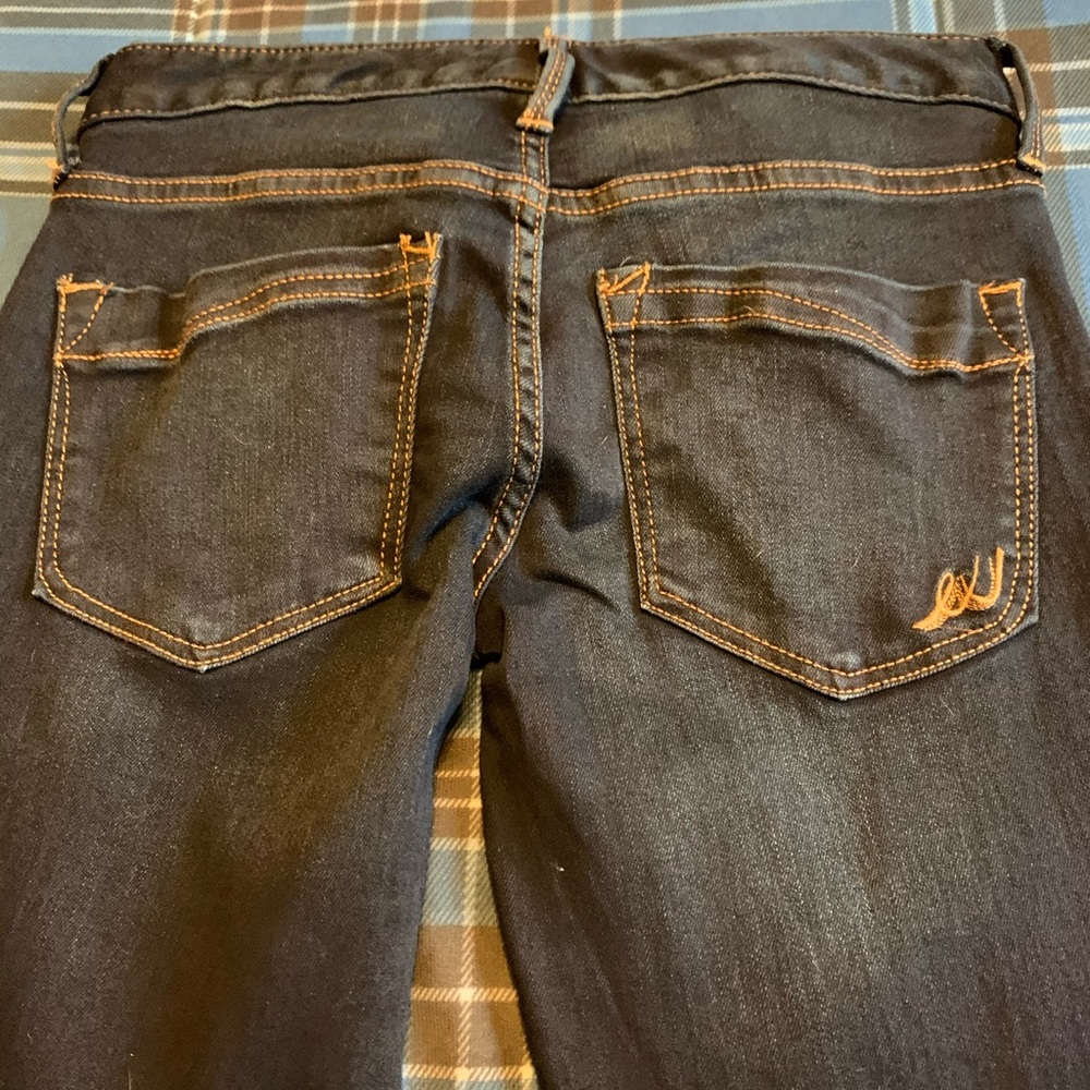 Express low rise, skinny leg blue jeans.